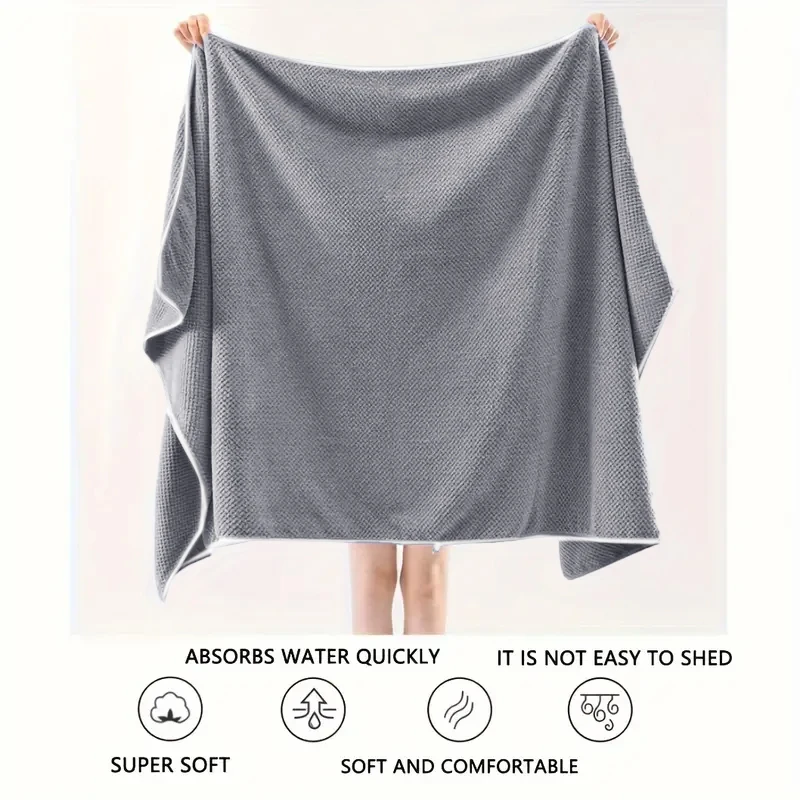 quatre draps de bain luxueux